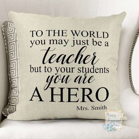 To the world you may just be a teacher but to your students you are a hero - throw pillow