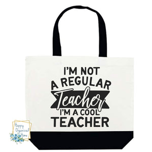 I'm not a regular teacher I'm a cool teacher. Black and White teacher tote bag.